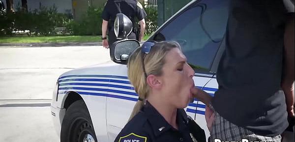  Busty police officers IR banged in the middle of the street